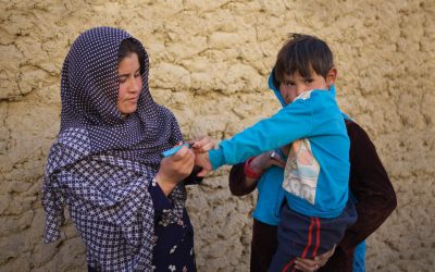 Child has finger coloured purple to indicate polio vaccination